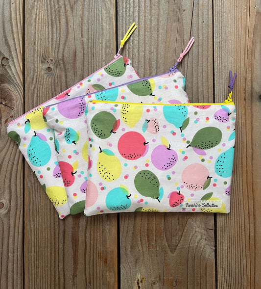 Waterproof lined zipper bag in bright fruity print