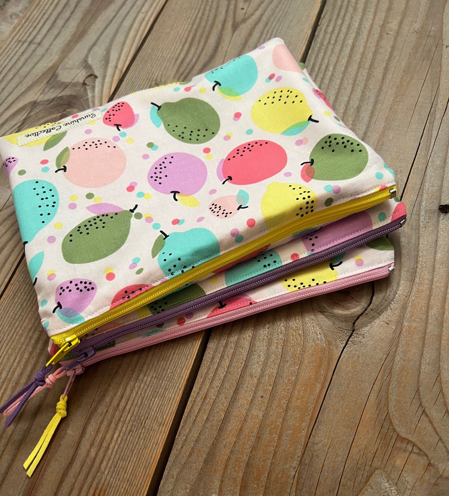 Waterproof lined zipper bag in bright fruity print