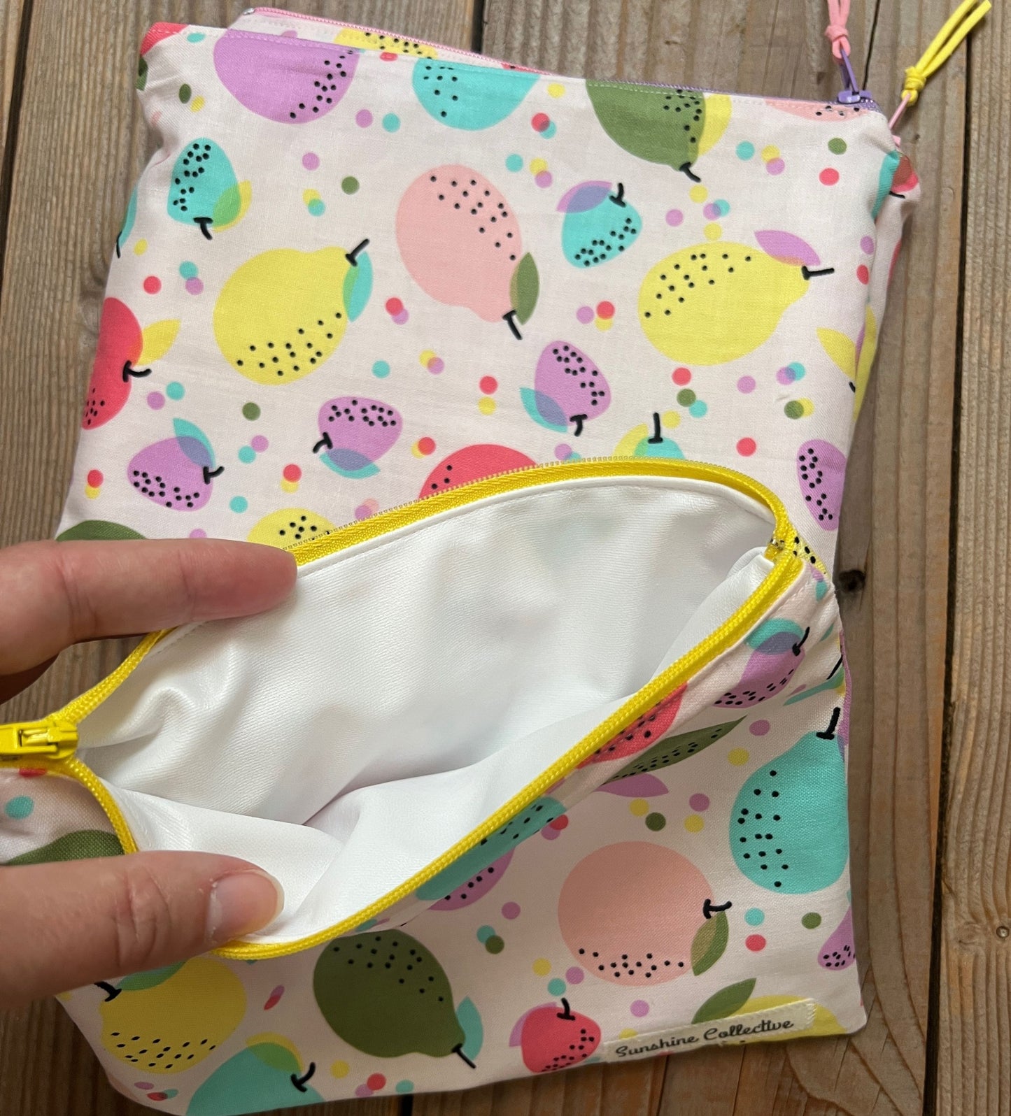 Waterproof lined zipper bag in bright fruity print