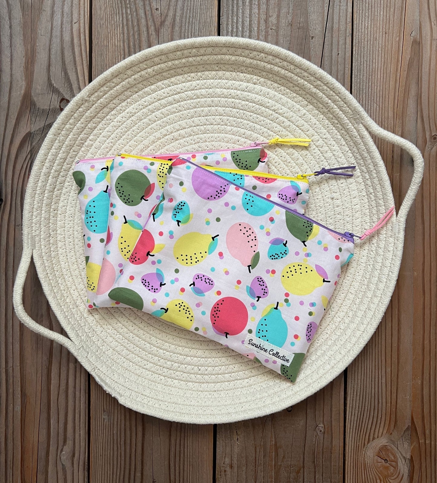 Waterproof lined zipper bag in bright fruity print