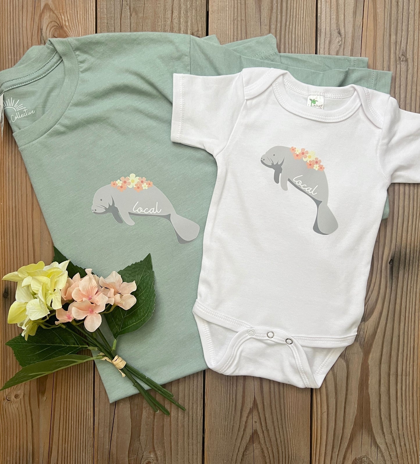 'Local' manatee baby bodysuit