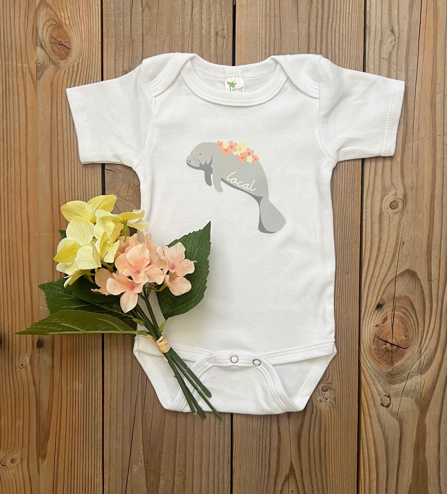 'Local' manatee baby bodysuit