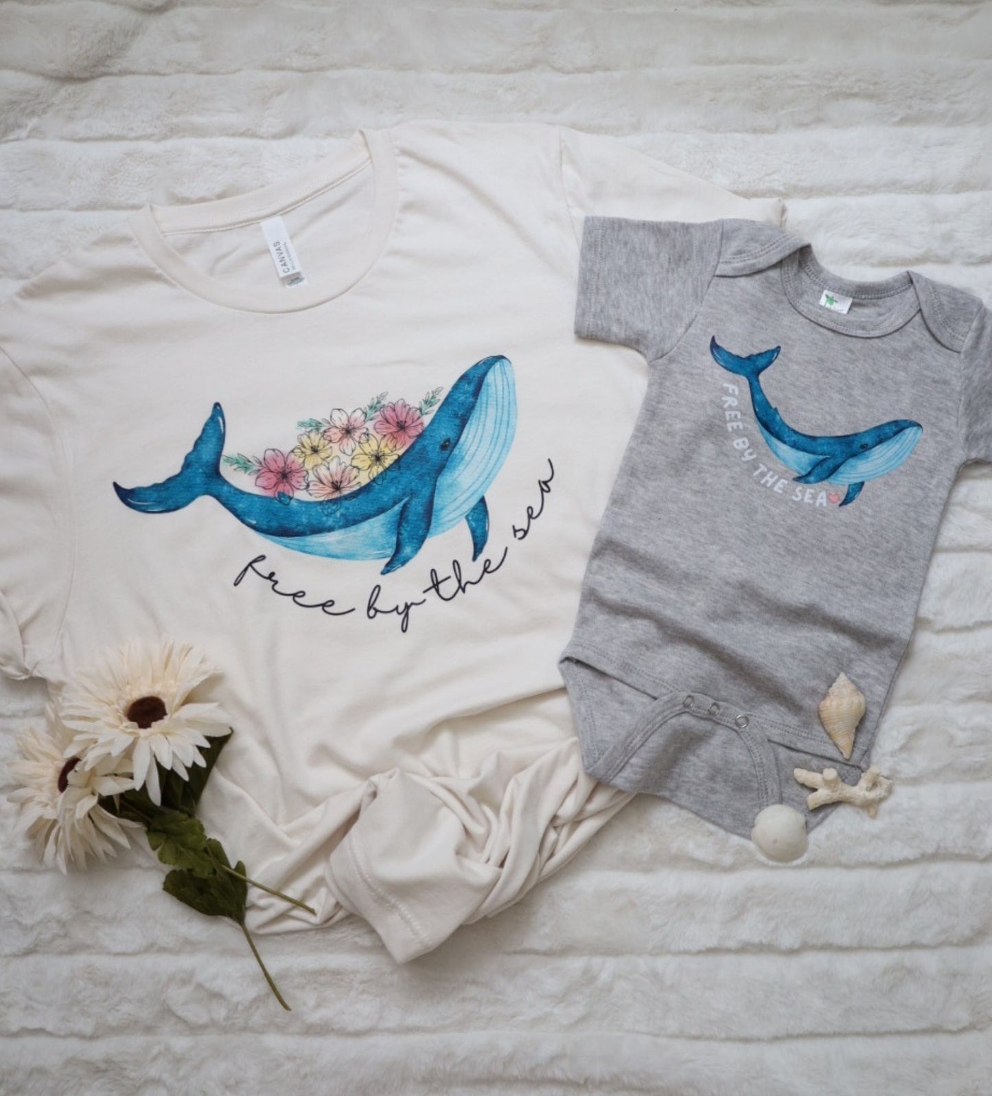 'Free by the Sea' baby whale bodysuit