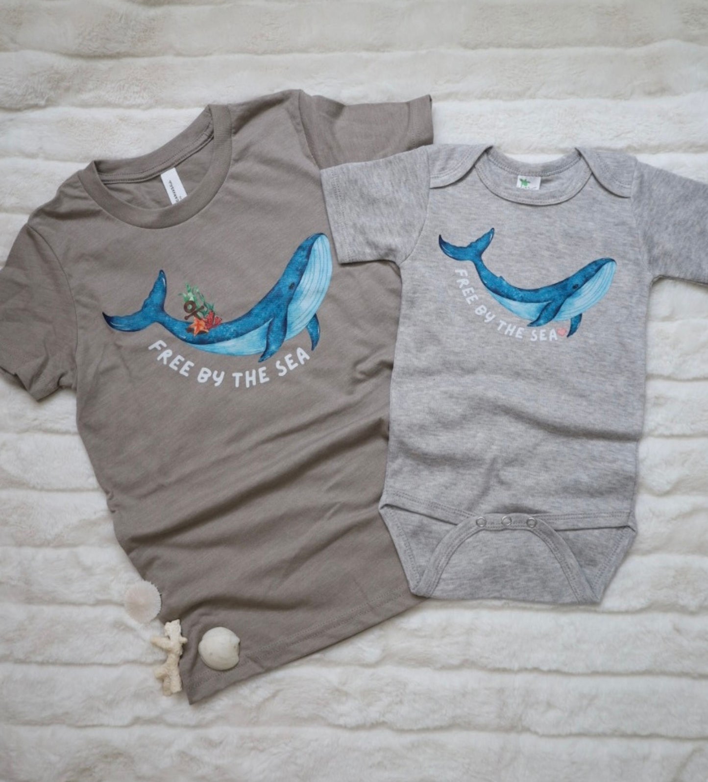 'Free by the Sea' baby whale bodysuit